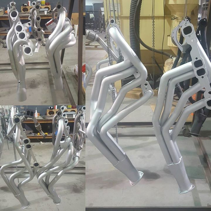 Coated exhaust headers on the workbench at PolyDyn in Houston