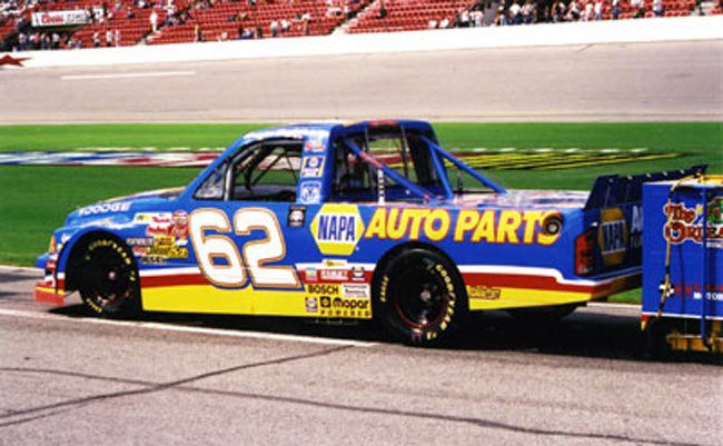 Number 62 race truck in NAPA Auto Parts livery on pit road