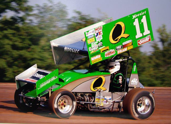 Number 11 sprint car, side view on grass